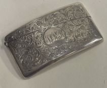 An engraved silver card case. Birmingham 1907. By Deakin & Francis.