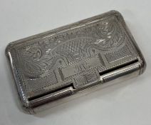 An early 19th Century French silver engraved hinged snuff box.