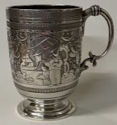 EDINBURGH: A very fine Victorian silver chased chinoiserie christening mug. 1880.
