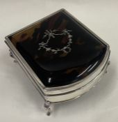 An attractive tortoiseshell and silver mounted jewellery box. London. By CR.