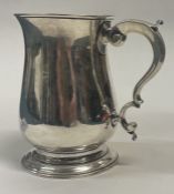 A good George III 18th Century silver pint mug. London 1773. By Thomas Tookey.