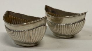A pair of silver fluted salts. Birmingham 1894.