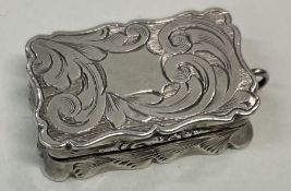 A Victorian silver engraved vinaigrette. Birmingham 1856. By Alfred Taylor.