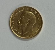 A 1928 full gold sovereign.