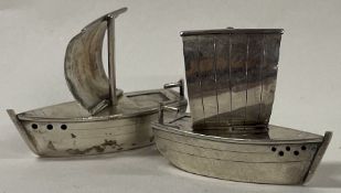 A pair of Japanese silver peppers in the form of boats. Marked sterling 950.