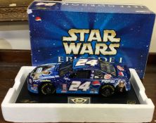 STAR WARS: A 1:18 scale boxed model of a Chevrolet Monte Carlo with Star Wars livery.