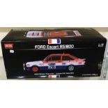 A 1:18 scale Limited Edition boxed model car of a Ford Escort RS1800.
