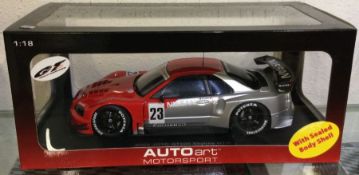 AUTOART: A 1:18 scale boxed model race car of a 2003 JGTC GT500 Skyline GT-R.