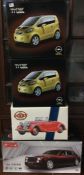 Four various boxed model cars.