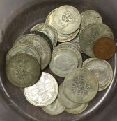 A tub containing pre 1947 coinage.