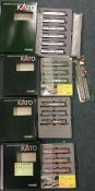 KATO: A large collection of boxed model railway track and engines.