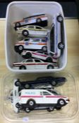 A selection of unboxed Corgi and other police cars.
