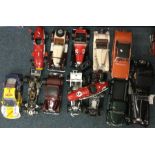 A collection of 1:18 scale unboxed model cars.