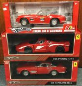 HOT WHEELS: Three 1:18 scale boxed model Ferrari cars.