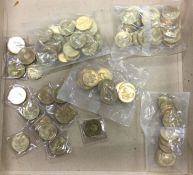 A large collection of two pound coins.