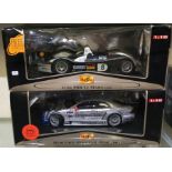 MAISTO: A 1:18 scale boxed model of an Audi R8R Le Mans together with a model of a Mercedes-Benz.