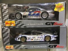 MAISTO: A 1:18 scale boxed model of a Mercedes CLK-GTR together with a boxed model of a Porsche 911.