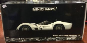 MINICHAMPS: A 1:18 scale boxed model race car of a Maserati Tipo 61.