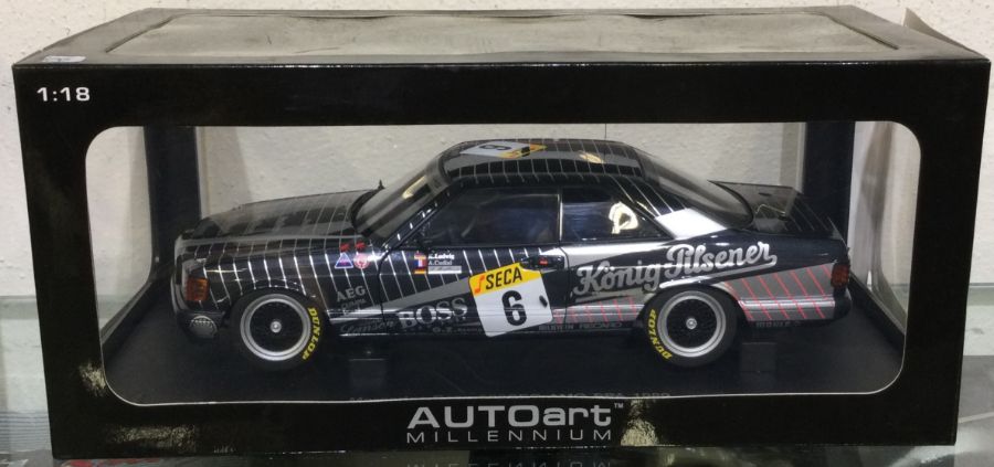 AUTOART: A 1:18 scale boxed model race car of a Mercedes-Benz 500SEC AMG.