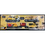CAT: A large boxed model of a construction express train.