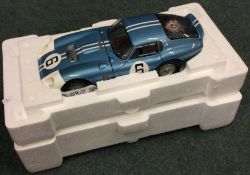 RACE LEGENDS: A good Cobra Datona 1:18 scale unboxed model car.