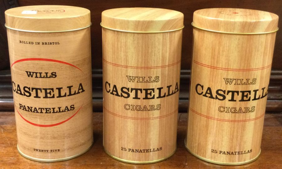 Castella: Three tins of cigars.