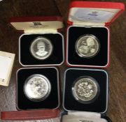 An Isle of Man Proof silver crown coin together with a silver five pound coin etc.