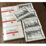 Five packs of Sobranie cigarettes together with three packs of Peter Stuyvesant cigarettes.