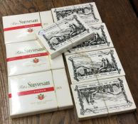 Five packs of Sobranie cigarettes together with three packs of Peter Stuyvesant cigarettes.