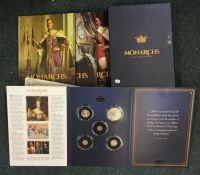 A set of "Monarchs of the Twentieth Century" Proof coins together with books.