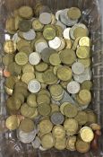 A large tub containing old fifty pence coins etc.