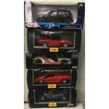 Five various 1:18 scale boxed model cars.