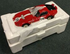 RACE LEGENDS: A Cobra Datona 1:18 scale unboxed model car.