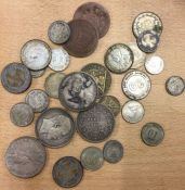 A quantity of silver and other coins.