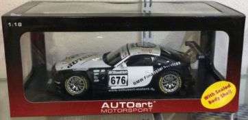 AUTOART: A 1:18 scale boxed model race car of a BMW Z4 Coupe.