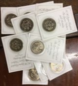 Eleven Commemorative five pound coins.