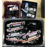 A selection of unboxed Corgi and other police cars.