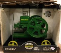 ERTL: A 1:6 scale boxed model of a John Deere Model "E".