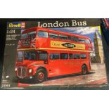 A boxed Revell 1:24 scale model bus.