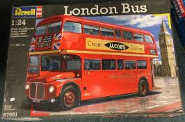 A boxed Revell 1:24 scale model bus.