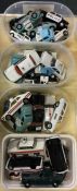 A large group of unboxed police cars.
