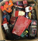 A box containing Corgi, Matchbox and other toy cars.
