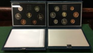 Three Royal Mint Proof coin sets.