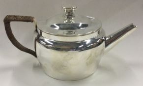 CHRISTOPHER DRESSER FOR HUKIN & HEATH: A fine silver plated teapot.
