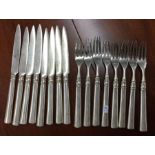 WANG HING: A set of eight Chinese export silver knife and forks. Circa 1900.