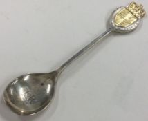 An Elizabeth II silver spoon. Approx. 35 grams. Est. £30 - £50.