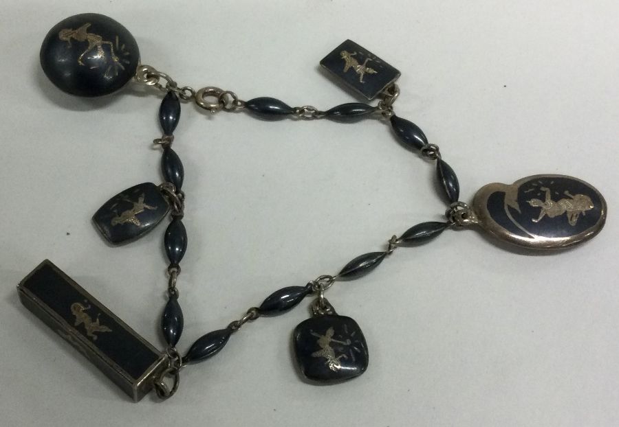 A silver and black enamelled bracelet with ring clasp. Approx. 24 grams.