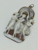 A gold mounted cameo depicting 'The Three Graces'. Approx. 5 grams.