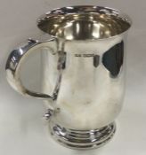 An oversized silver pint mug. Sheffield 1964. By Finnigans Ltd. Approx. 530 grams.