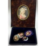 A group of four oval porcelain miniatures etc. Est. £20 - £30.